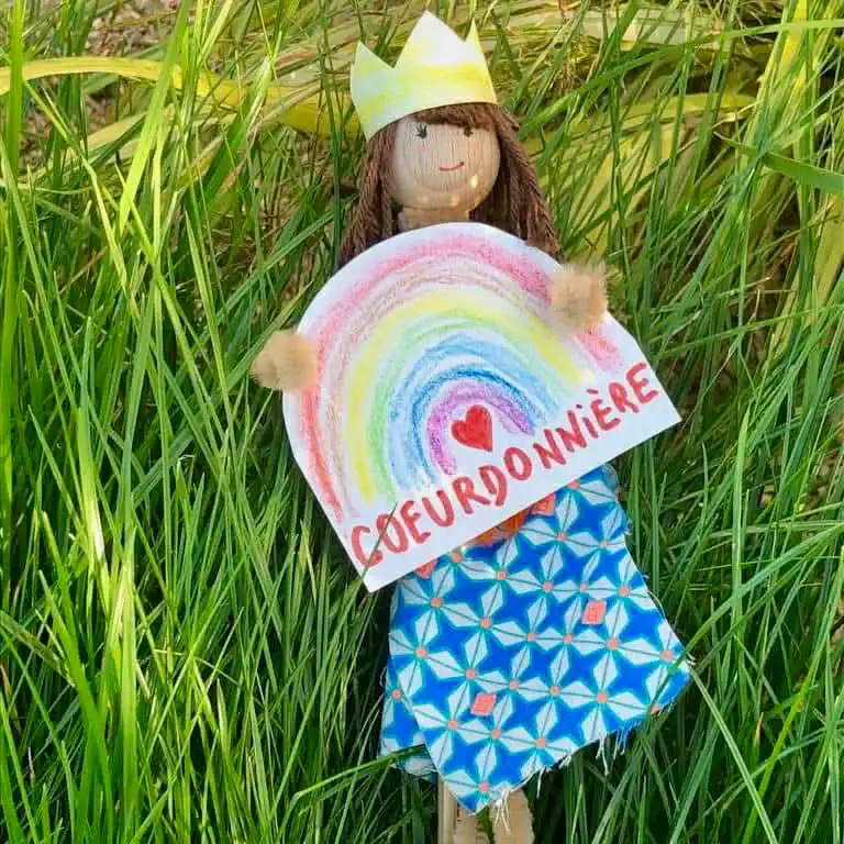 girl in white dress standing beside man in blue and white plaid dress shirt